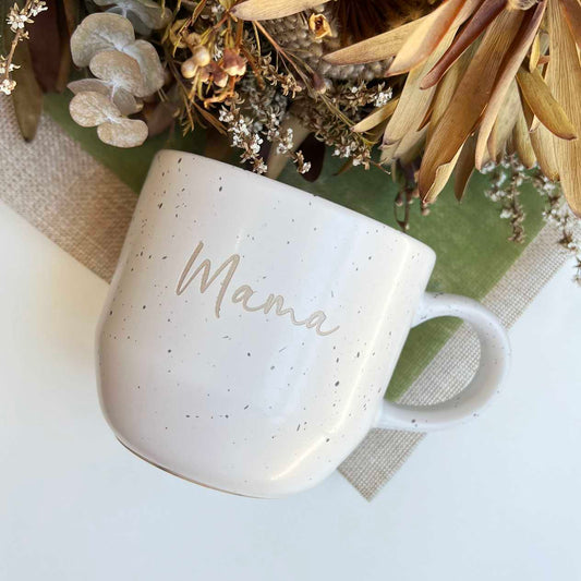 Top view of speckled ceramic mug with laser engraving