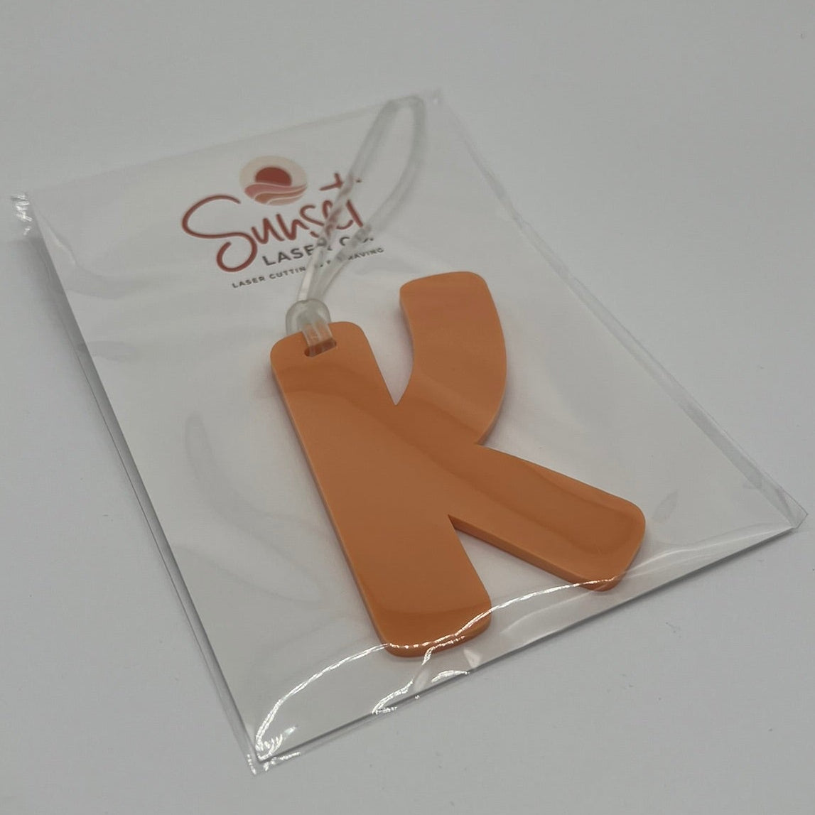 Orange Letter K Bag Tag