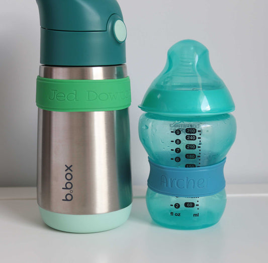 Engraved silicone band stretched on water bottle