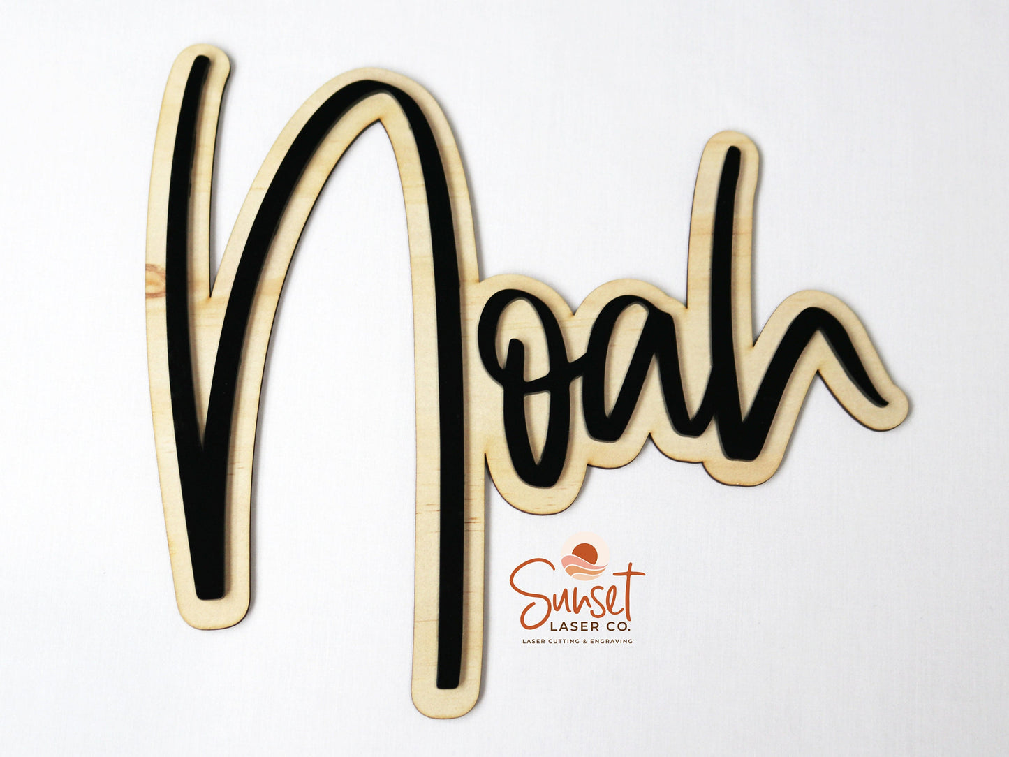 Custom wooden and acrylic name sign close-up
