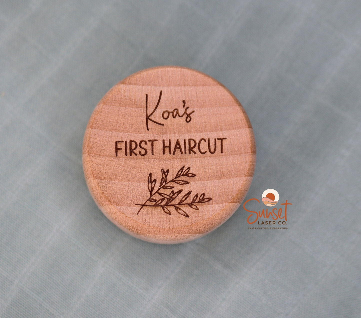 Close-up of custom laser engraving on wooden box