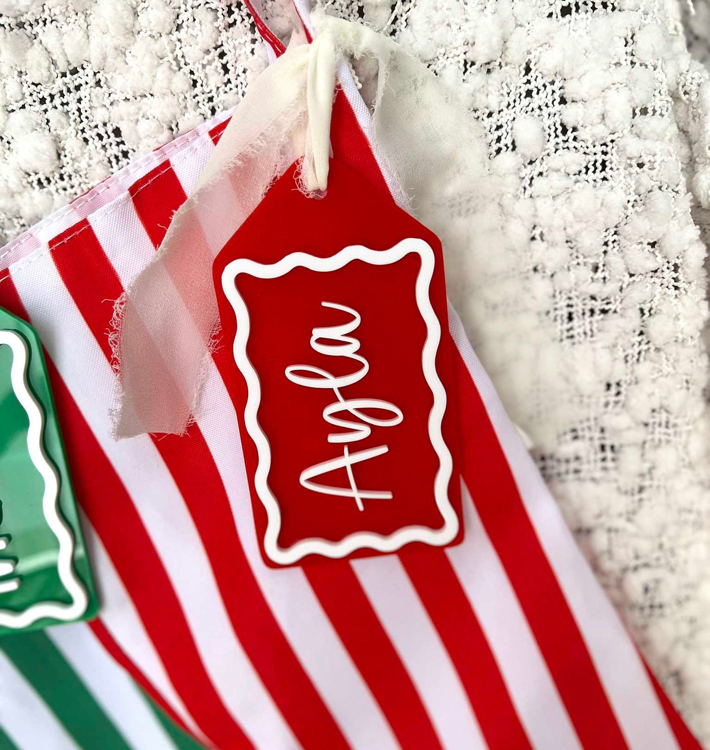 Red and White Candy Cane Stripe Christmas Stocking with Matching Custom Acrylic Name Tag