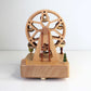 Back View of Personalised Wooden Musical Carousel in Ferris Wheel Design with Mini Carriages and Trees