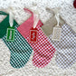 Green Gingham Christmas Stocking with Green Solid Colour Cuff shown with Green and White Custom Name Tag