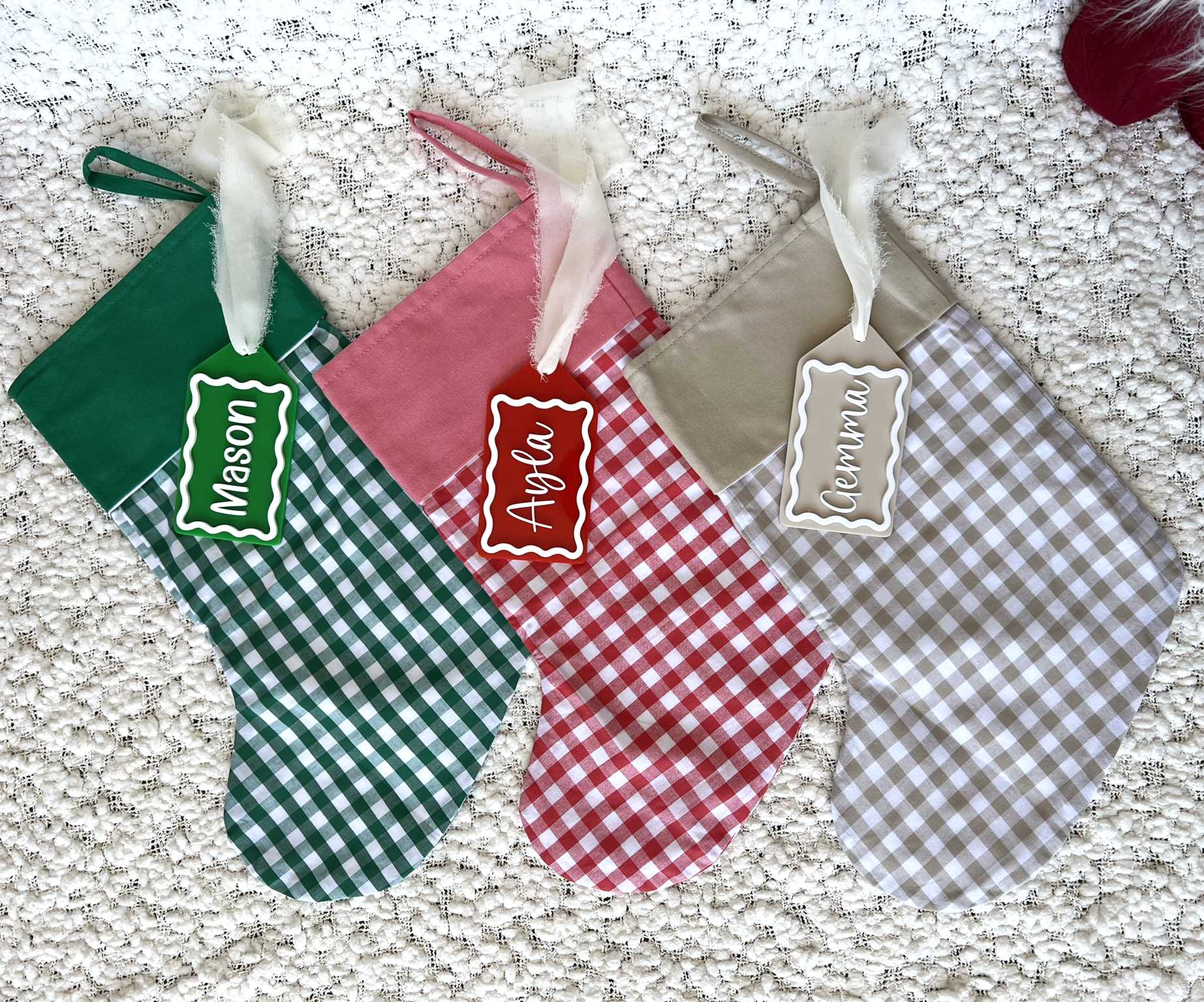 Green Gingham Christmas Stocking with Green Solid Colour Cuff shown with Green and White Custom Name Tag