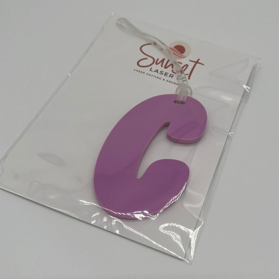 Acrylic letter bag tag in pastel candy