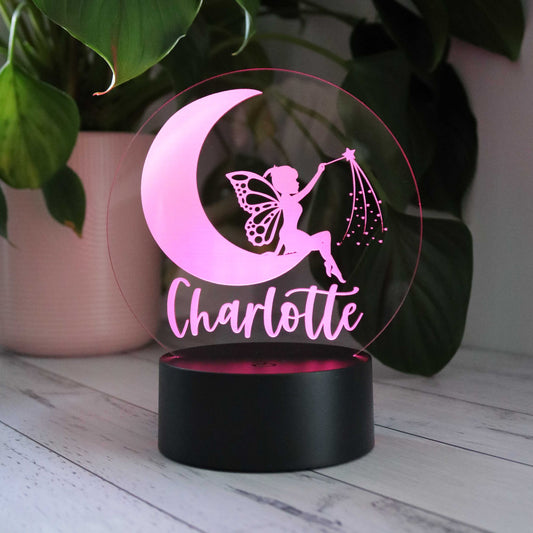 Personalised Kids Night Light Fairy Moon Design Shown with Pink LED Light On