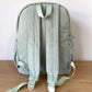 Large Green Corduroy Backpack Back View showing shoulder straps and back of bag.
