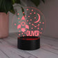 Personalised Kids Night Light Space Design shown with red LED light on