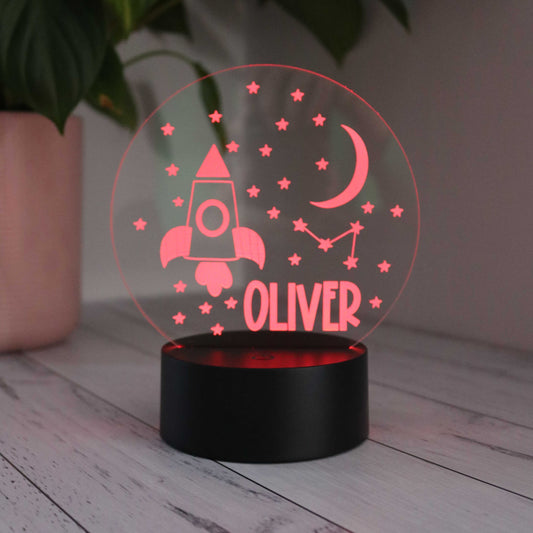 Personalised Kids Night Light Space Design shown with red LED light on