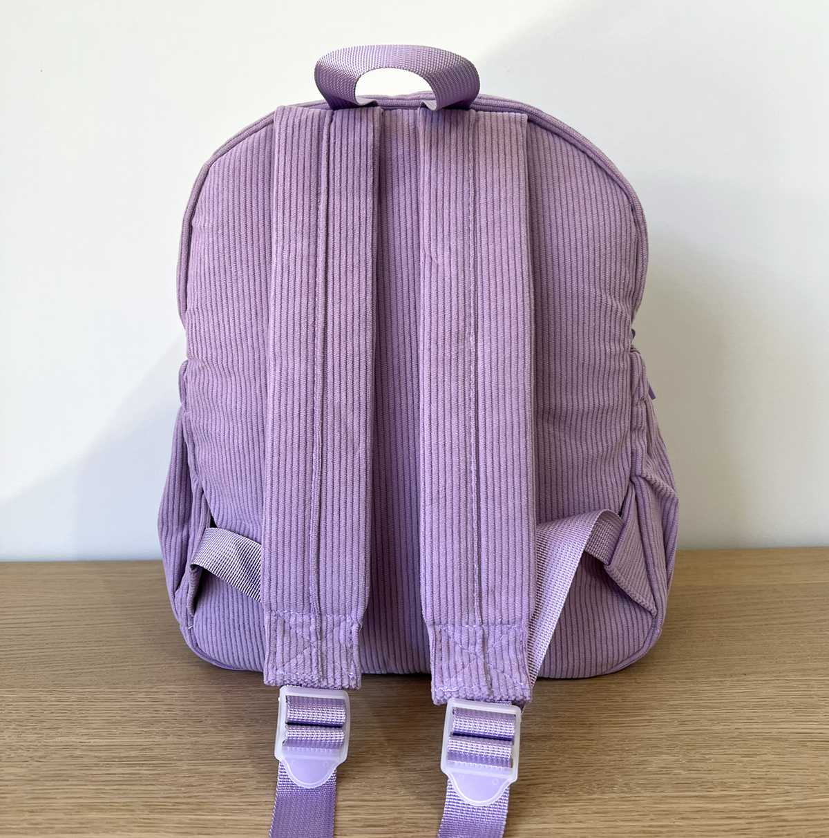 Purple Corduroy Backpack, back view showing shoulder straps