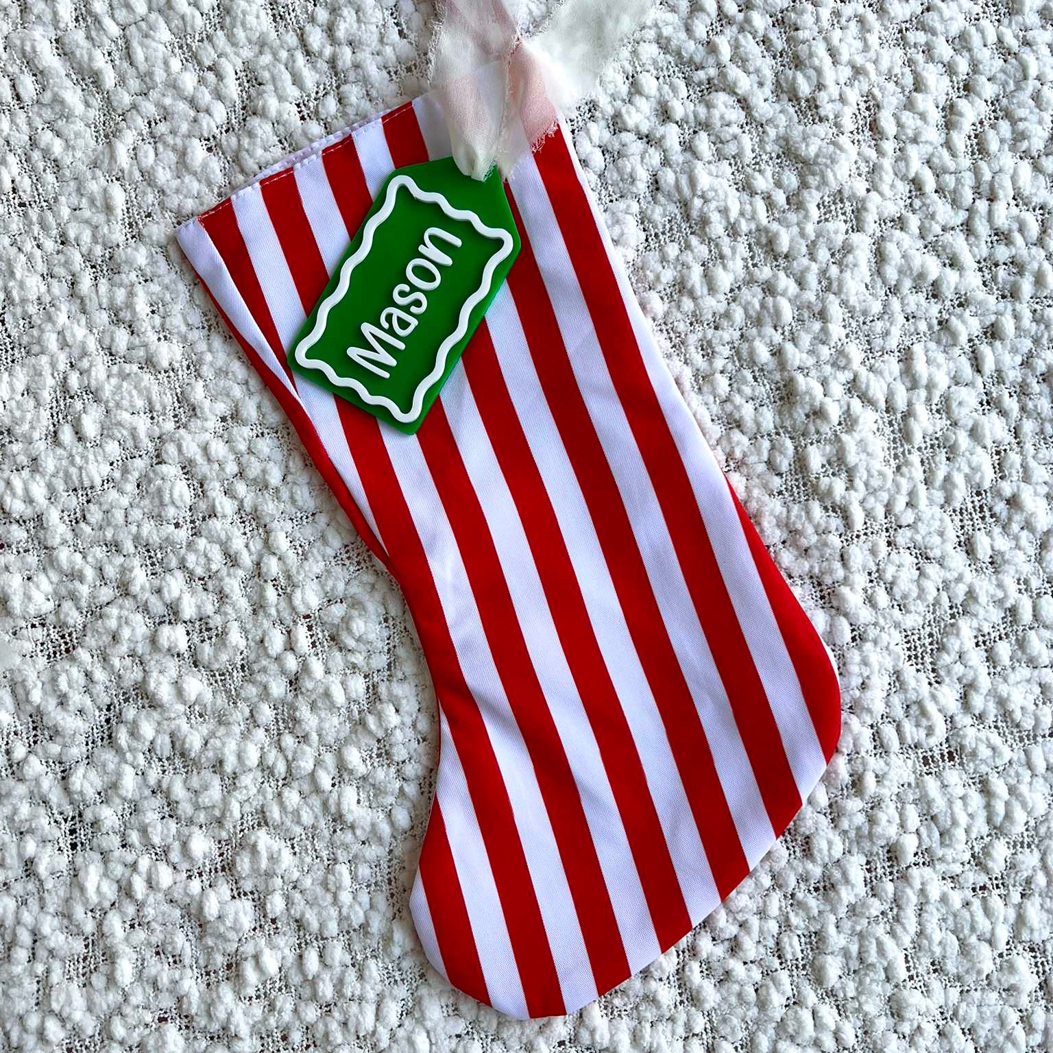 Red and White Stripe Christmas Stocking with Green and White Acrylic Name Tag