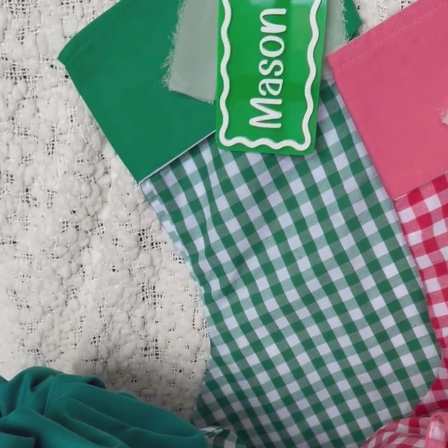 Green Gingham Christmas Stocking with Green Solid Colour Cuff shown with Green and White Custom Name Tag Video